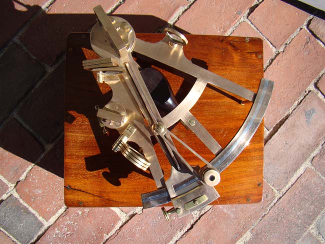 A beautiful 19th century brass framed mariners' sextant with its' original mahogany box circa 1850